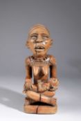 A YOMBE MATERNITY FIGURE