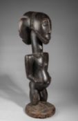 A HEMBA STANDING MALE FIGURE