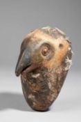 A MAKONDE BIRD HEAD MASK