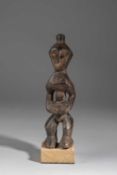 A METOKO STANDING FIGURE