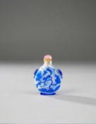 A CHINESE BLUE-OVERLAY GLASS SNUFF BOTTLE