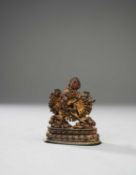 A TIBETAN GILT LACQUERED-COPPER FIGURE OF VAJRABHAIRAVA AND VAJRAVETALI