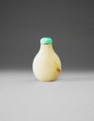 A CHINESE NEAR WHITE JADE SNUFF BOTTLE