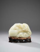 A FINE CHINESE WHITE JADE 'RED CLIFF' BOULDER CARVING
