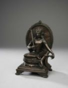 A HIMALAYAN BRONZE FIGURE OF A BODHISATTVA