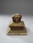A HIMALAYAN GILT-MARBLE AND BRONZE-INSET STUPA