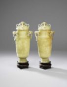 A PAIR OF CHINESE CELADON JADE MUGHAL-STYLE VASES AND COVERS