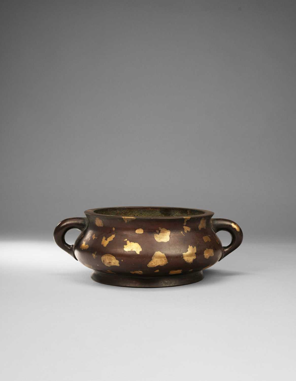 A LARGE CHINESE GOLD-SPLASHED BRONZE TWO-HANDLED INCENSE BURNER QING ...