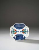 A SMALL JAPANESE ARITA FOOTED DISH