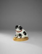 A JAPANESE KUTANI MODEL OF A PUPPY