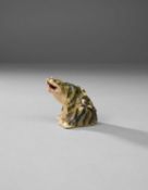 A SMALL JAPANESE MODEL OF A TIGER