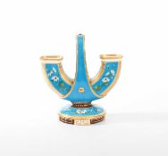 Christopher Dresser (1834-1904) for Minton, a U-shaped porcelain vase with a handle