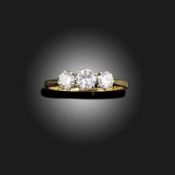 A DIAMOND THREE STONE RING