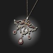 AN EDWARDIAN RUBY AND DIAMOND PENDANT