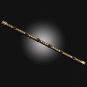A SAPPHIRE-SET GOLD BRACELET