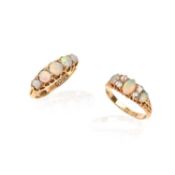 TWO EARLY 20TH CENTURY OPAL-SET GOLD RINGS