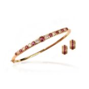 A RUBY AND DIAMOND BANGLE AND A PAIR OF RUBY AND DIAMOND EARRINGS