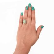 AN OPAL AND DIAMOND CLUSTER RING