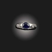 A SAPPHIRE AND DIAMOND RING