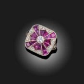 A RUBY AND DIAMOND CLUSTER RING
