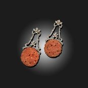 A PAIR OF CARVED CORAL AND DIAMOND EARRINGS