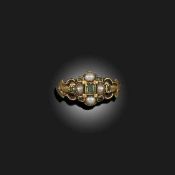 A REGENCY SEED PEARL AND EMERALD RING
