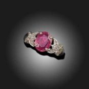 A SAPPHIRE AND DIAMOND RING