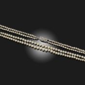 A TWO ROW NATURAL AND CULTURED PEARL NECKLACE