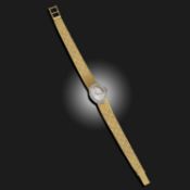 BUCHERER, A LADY'S DIAMOND-SET WRISTWATCH