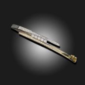A DIAMOND-SET HINGED BANGLE