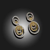 A PAIR OF DIAMOND AND YELLOW DIAMOND SET EARRINGS