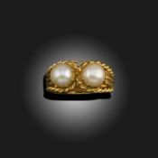 A CULTURED PEARL AND GOLD RING