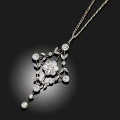 AN OPENWORK DIAMOND PENDANT