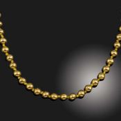 A YELLOW GOLD NECKLACE