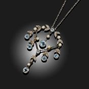 AN EDWARDIAN SEED PEARL AND AQUAMARINE PENDANT