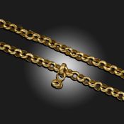 A YELLOW GOLD CONVERTIBLE LONG CHAIN / THREE BRACELETS