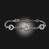 BULGARI, A 'BVLGARI BVLGARI' DIAMOND-SET GOLD BRACELET
