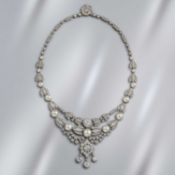 AN IMPRESSIVE BELLE ÉPOQUE NECKLACE SET WITH DIAMONDS AND PEARLS IN PLATINUM