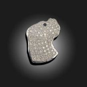 A DIAMOND AND SAPPHIRE BROOCH, MODELLED AS A DOG'S HEAD, C1989
