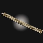 AN ITALIAN 9CT YELLOW GOLD BRACELET