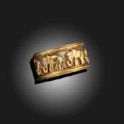 A DIAMOND-SET GOLD RING
