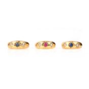 A GROUP OF THREE EDWARDIAN GEM-SET 18CT GOLD RINGS