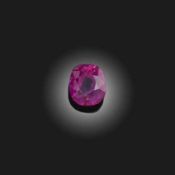 A LOOSE CUSHION-SHAPED PINK SAPPHIRE, WEIGHING 5.914CTS