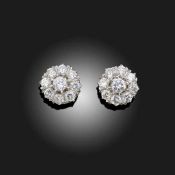A PAIR OF DIAMOND CLUSTER EARRINGS