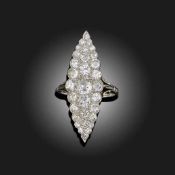 AN EDWARDIAN DIAMOND NAVETTE-SHAPED RING