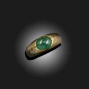 A SOLITAIRE EMERALD RING