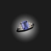 A TANZANITE AND DIAMOND RING