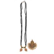 AN INDIAN EMERALD, RUBY, SEED PEARL AND DIAMOND PENDANT AND A NECKLACE