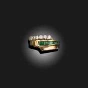 AN EMERALD AND DIAMOND RING