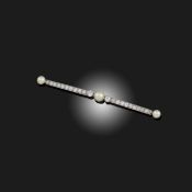 AN EARLY 20TH CENTURY PEARL AND DIAMOND BROOCH